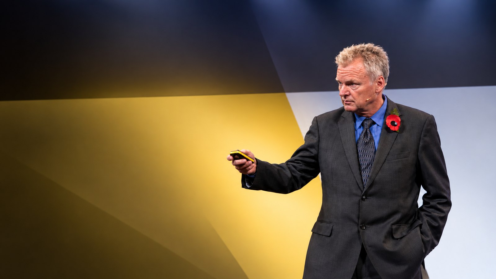 Dr. Dave Richards speaking on stage